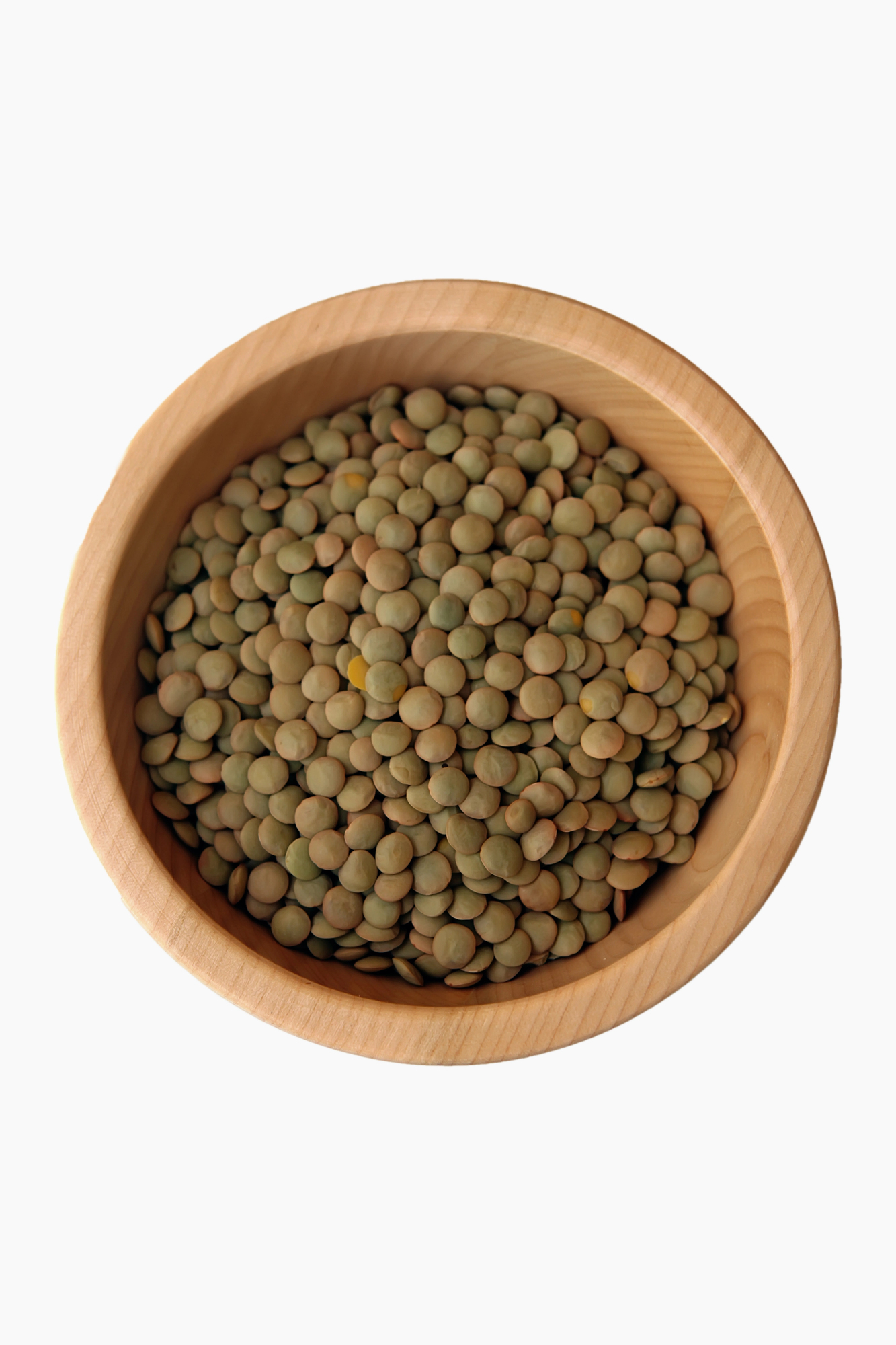 Dried lentils in wooden bowl