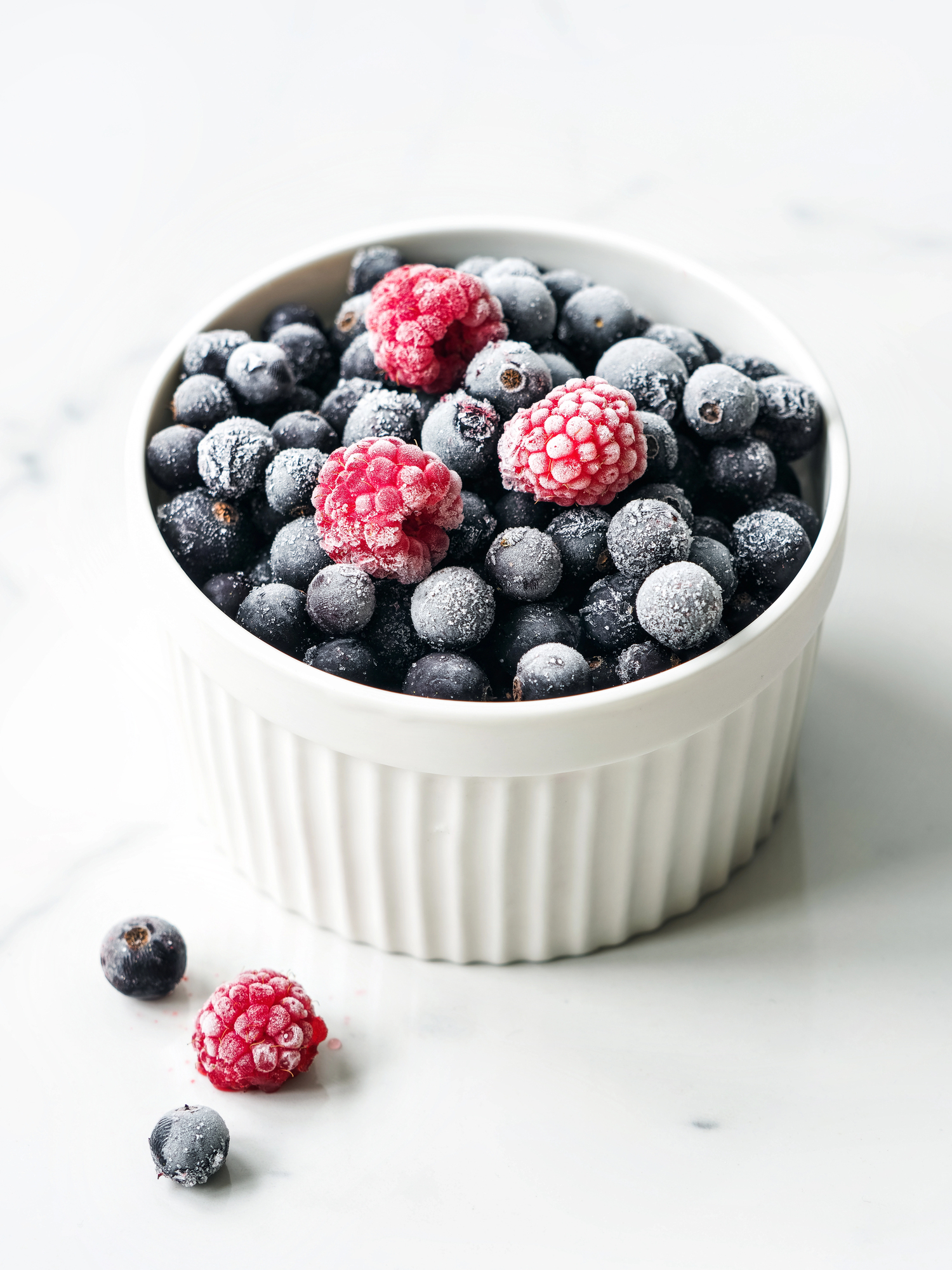 Bowl of fresh blueberries and raspberries