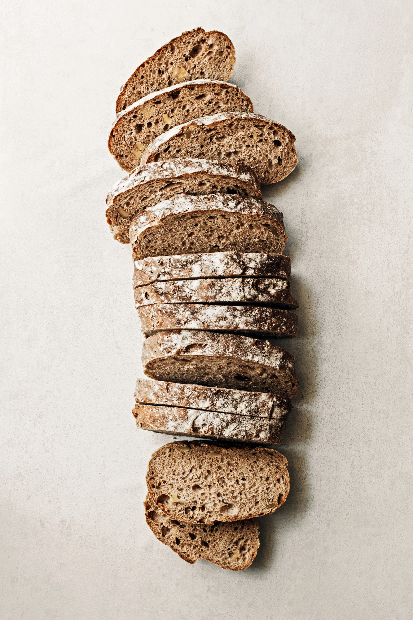 Sliced wholegrain bread stacked vertically