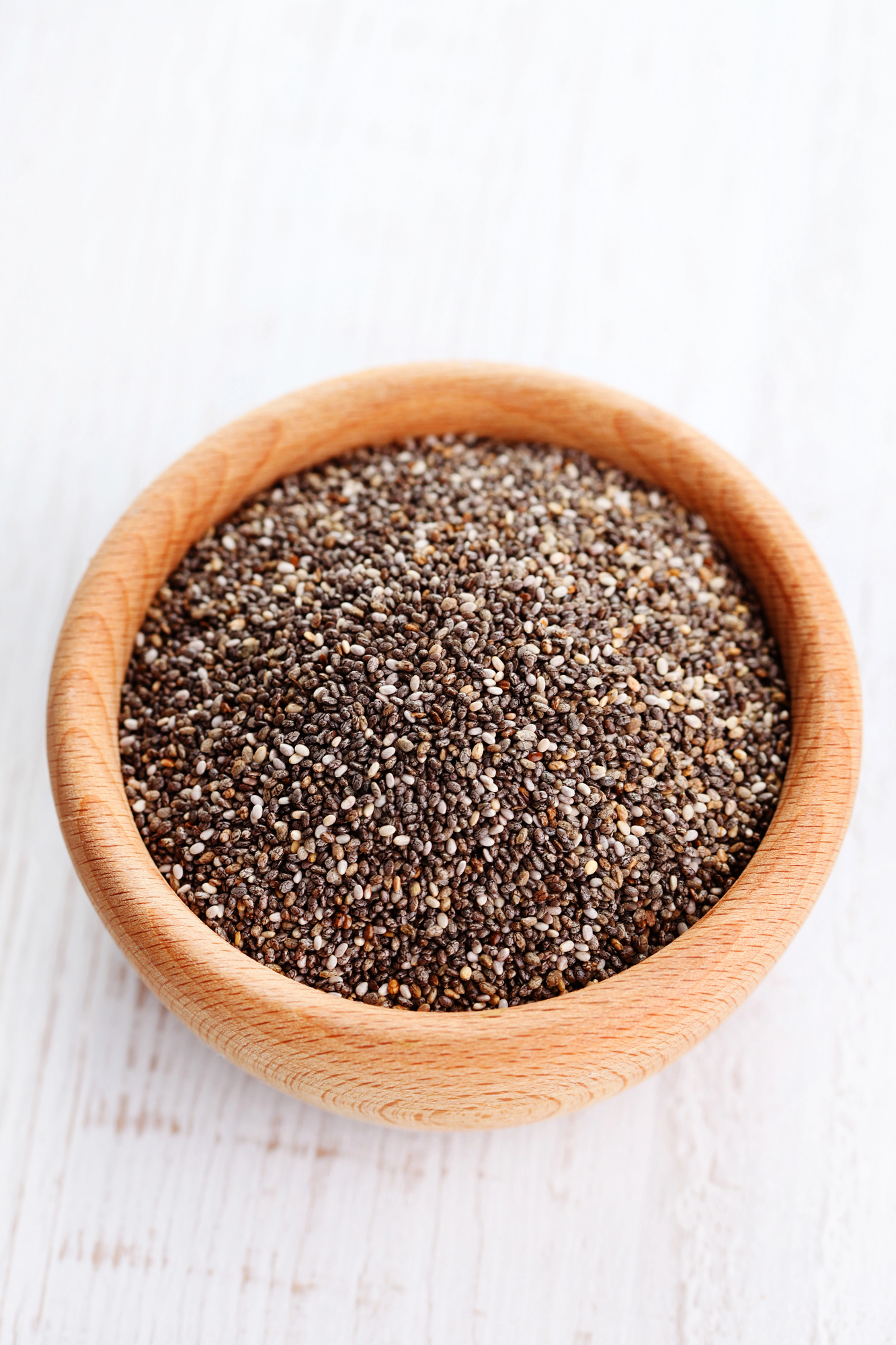 Wooden bowl filled with chia seeds