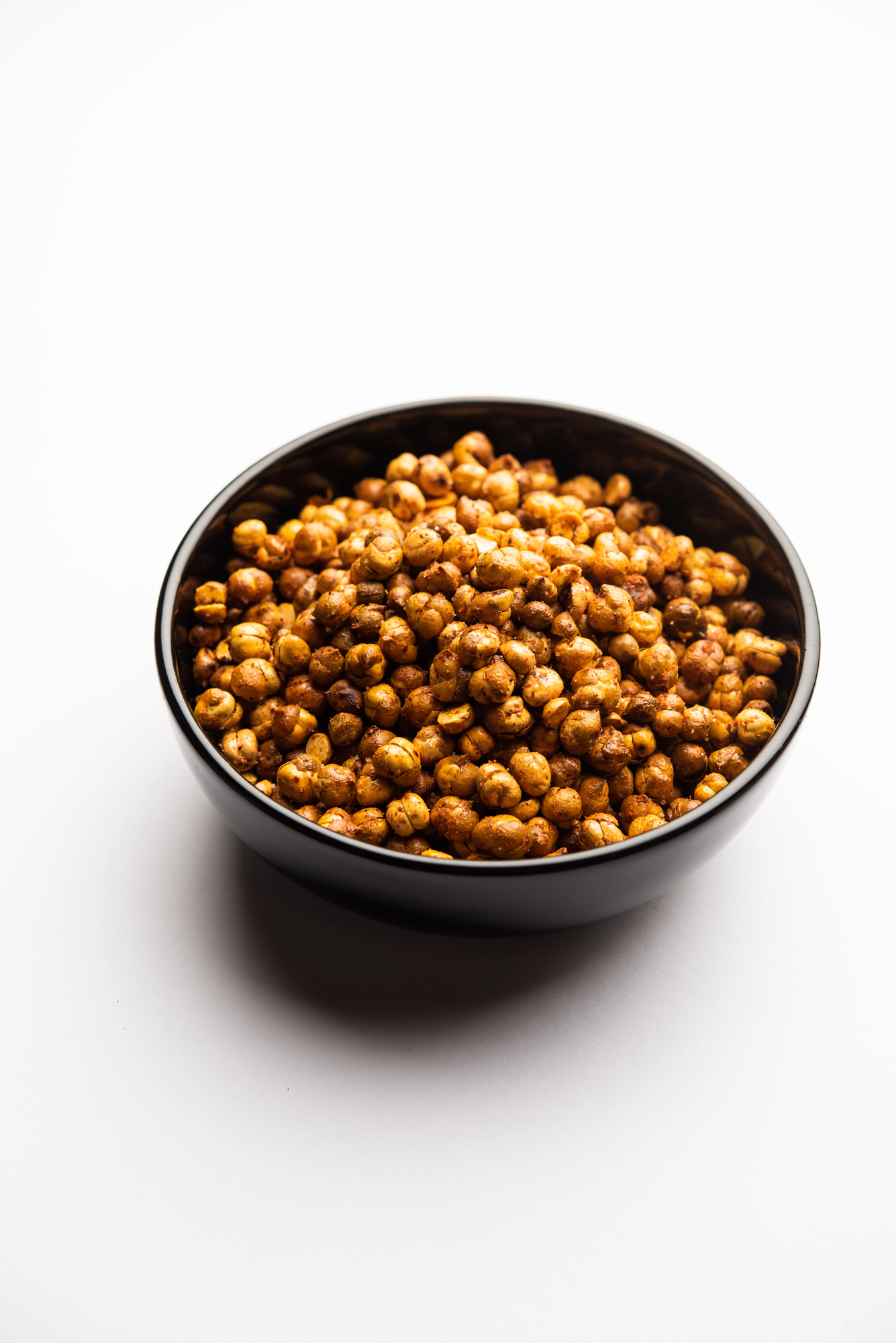 Roasted chickpeas in black bowl