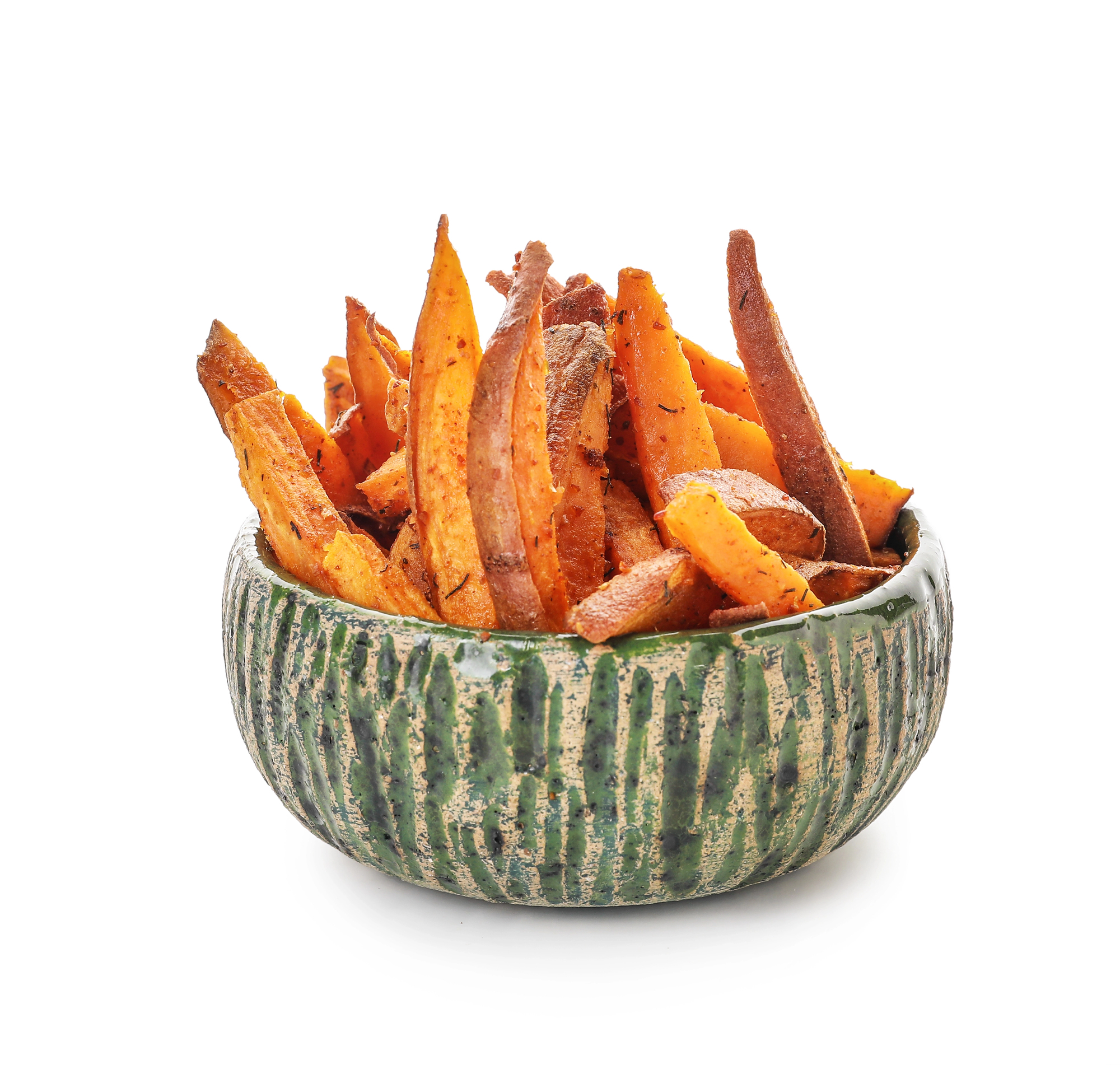 Cooked sweet potato wedges in striped bowl