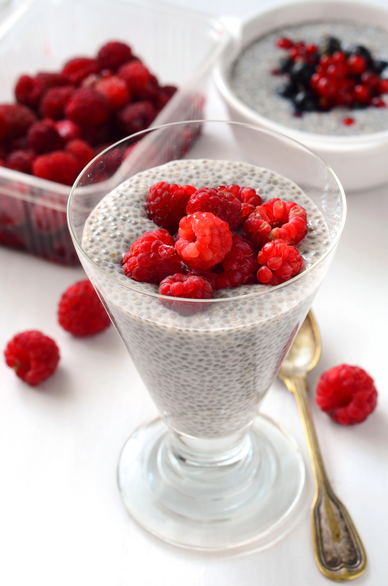 Chia seed pudding topped with fresh raspberries