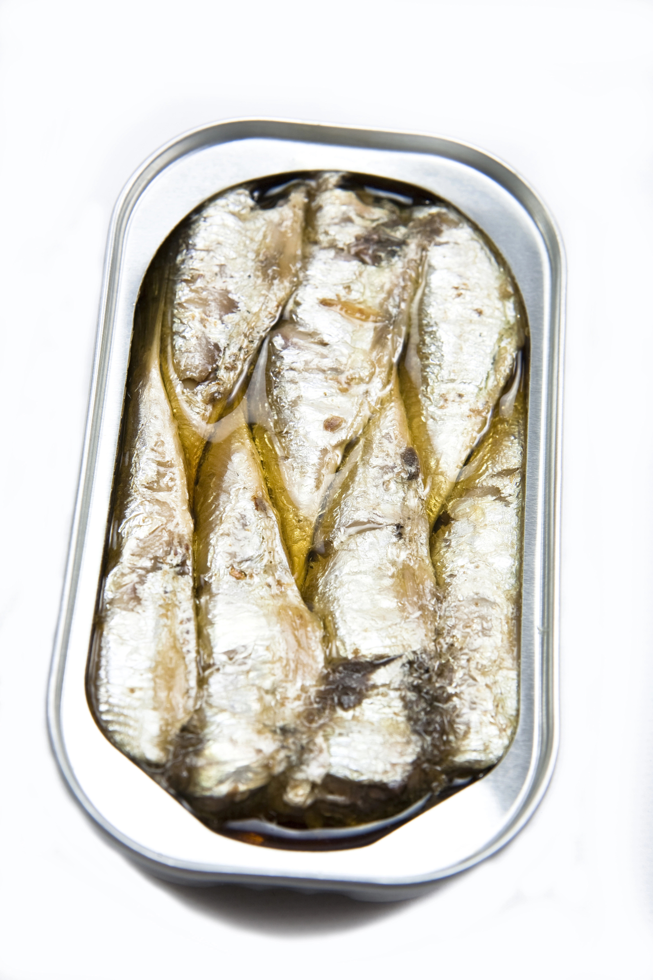 Open tin of canned sardines in oil