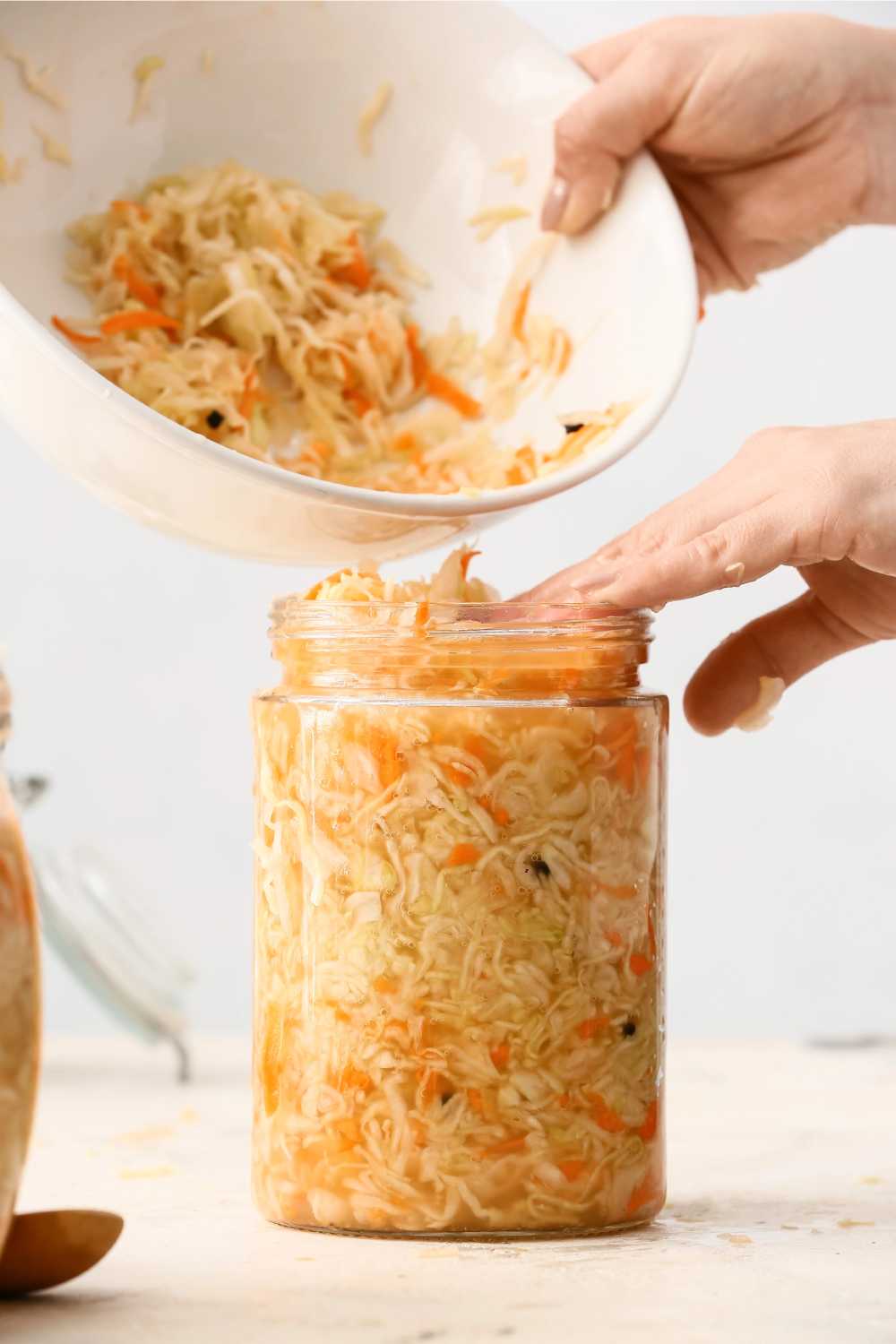 Pour Sauerkraut Brine
