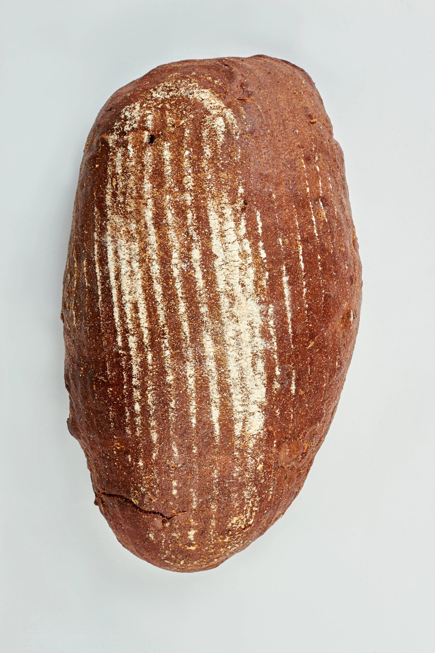 Sourdough bread loaf with scored pattern