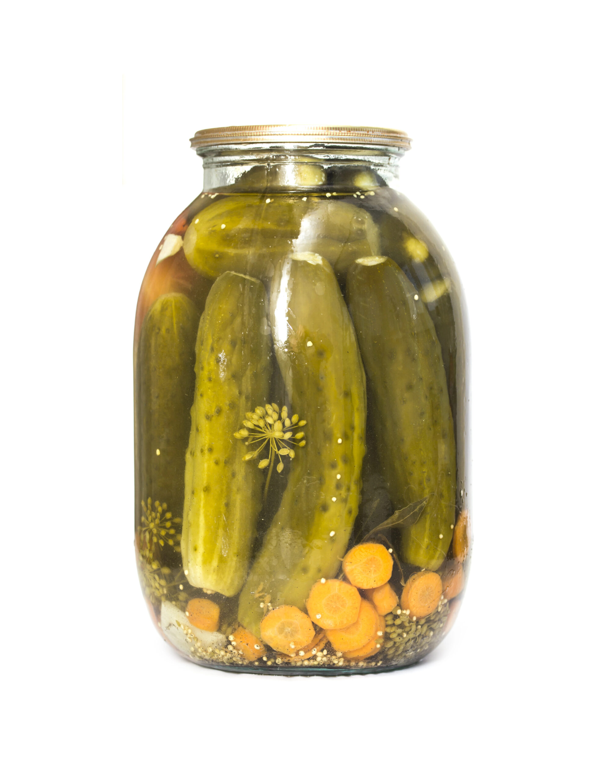 Jar of pickled cucumbers with garlic cloves