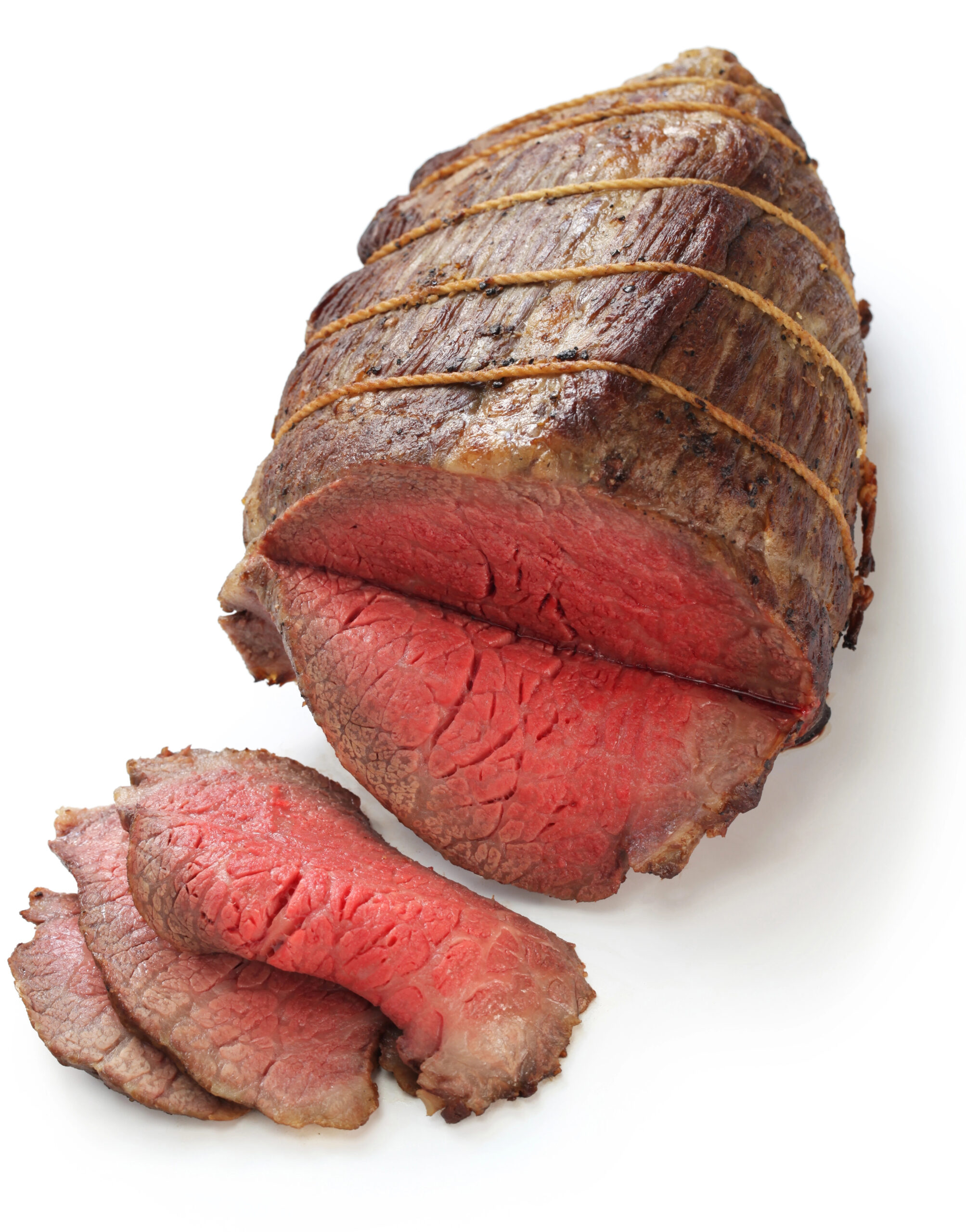 Sliced roast beef showing rare pink interior