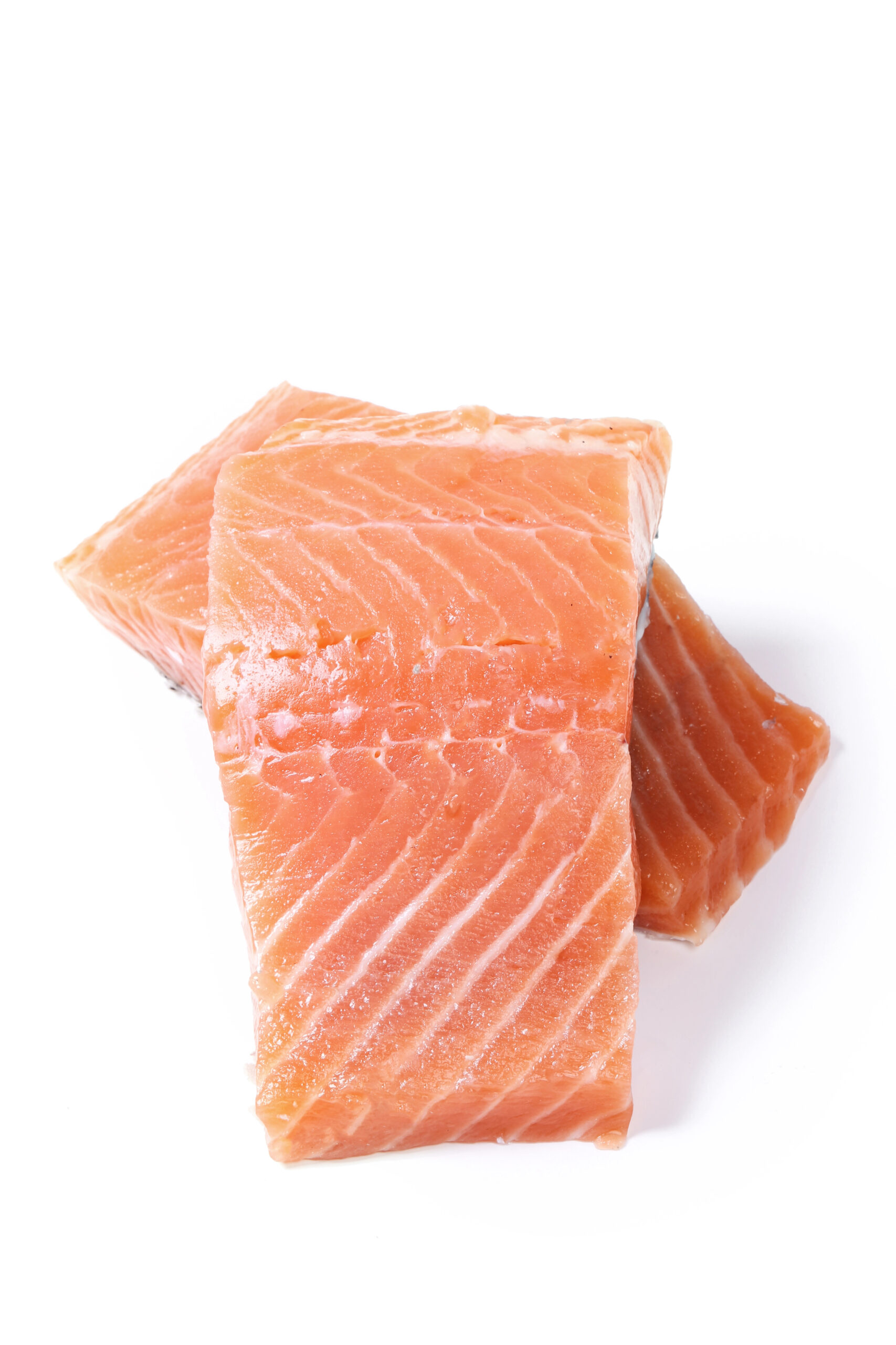 Raw salmon fillet in plastic wrap