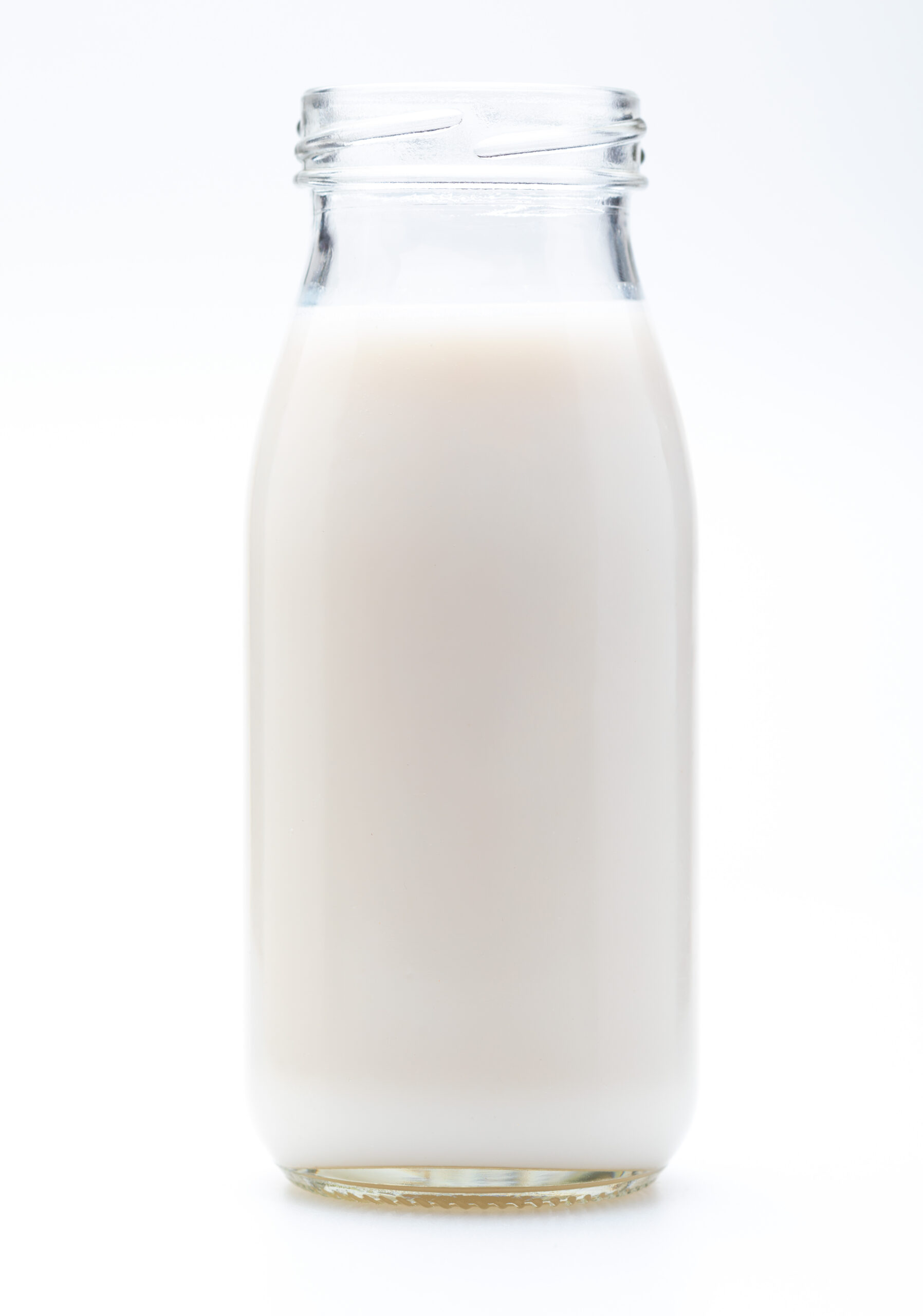 Glass bottle filled with milk